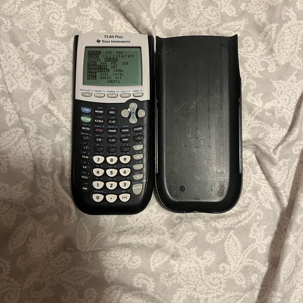 Texas Instruments TI-84 Plus Graphing Calculator - Black and White